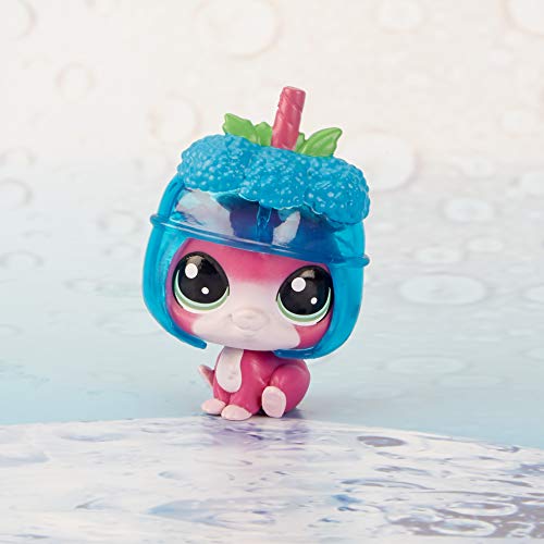 Pink puppy figure in a blue raspberry slushie cup helmet