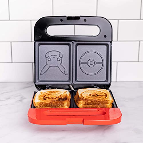 Two grilled cheese sandwiches stamped with Pikachu and a Poke Ball in the maker