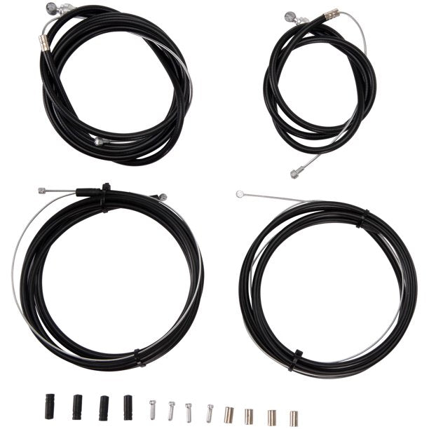 Four coiled bicycle cables laid out with ferrules and end caps