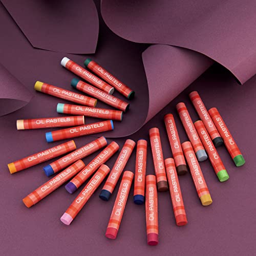 Red-wrapped oil pastels scattered on curled plum paper