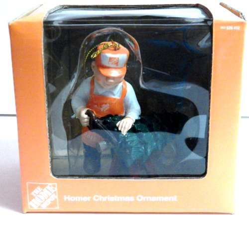 The tree-cutting ornament in its orange window box