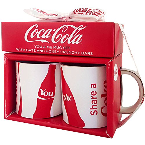 Red Coca-Cola gift box holding two white You and Me mugs with a ribbon bow