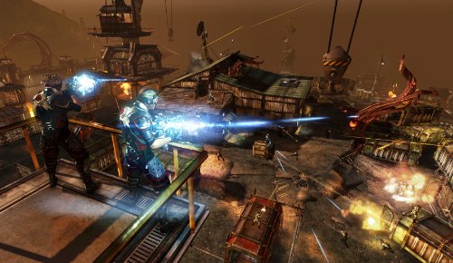 Defiance gameplay: two players firing energy weapons from a rooftop over a ruined town