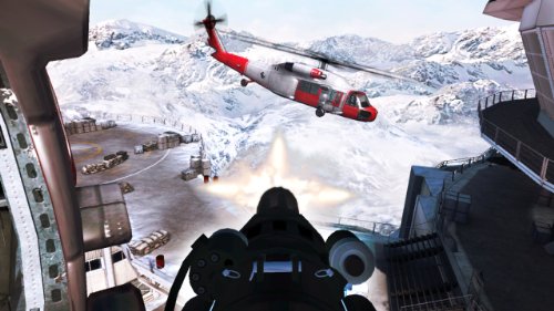 Mounted gun firing at a red and white helicopter over a snowy base