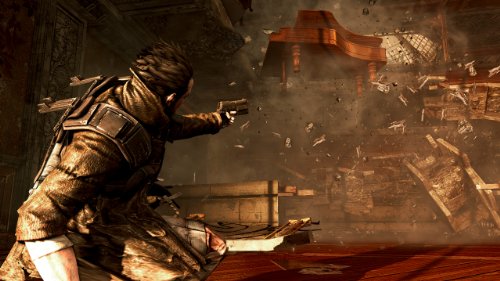 Hero firing a pistol as a wooden room explodes into splinters