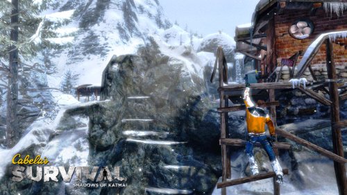 Climber in an orange jacket scaling a wooden scaffold on a snowy cliff