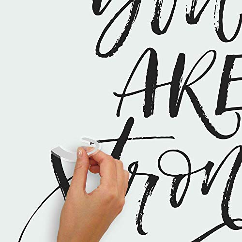 Hand peeling the clear backing off the S of the You Are Strong decal