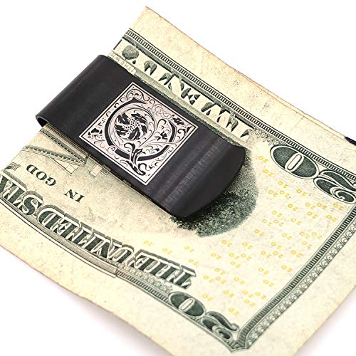 Black money clip with an ornate initial C holding a folded bill