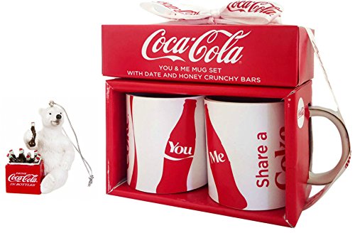 Coca-Cola You and Me mug set in a red box beside a polar bear ornament