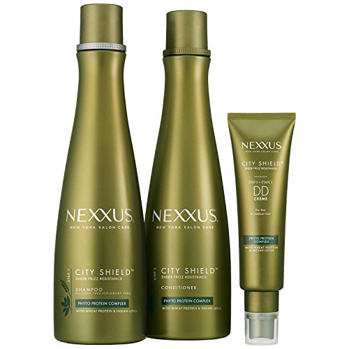 Nexxus City Shield shampoo, conditioner and DD Creme in green bottles