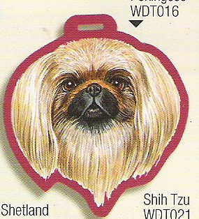 Luggage tag shaped like a painted Pekingese head with a red edge