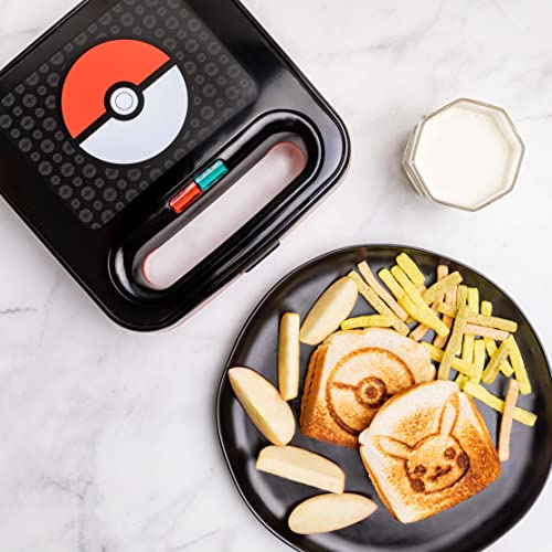 Black Poke Ball sandwich maker beside Pikachu and Poke Ball toasted sandwiches