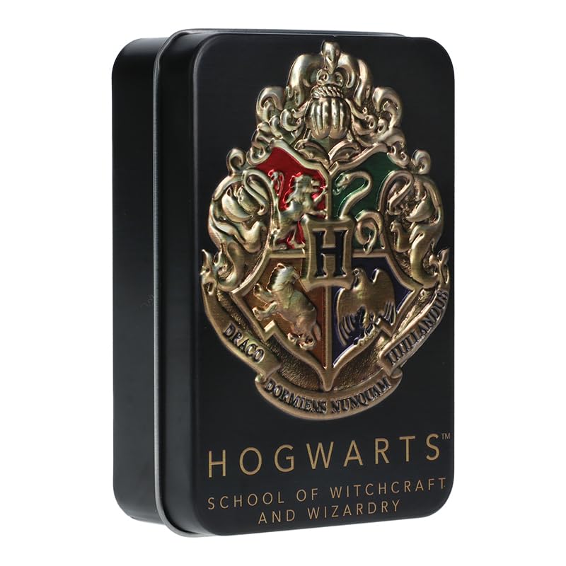 Black playing card tin with an embossed gold school crest