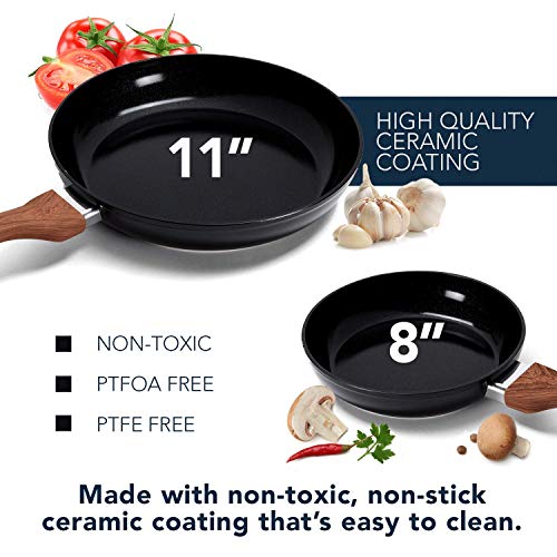 11 and 8 inch black ceramic pans with tomatoes, garlic and mushrooms