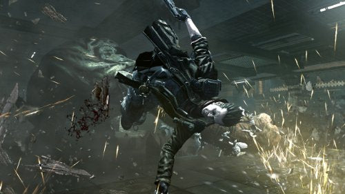 Hero spinning through the air with a rifle amid flying debris
