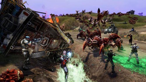 Defiance gameplay: players by a toppled bus fighting a swarm of red alien crabs
