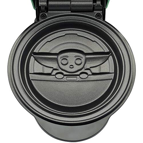 Close-up of the nonstick lower plate with the Grogu design