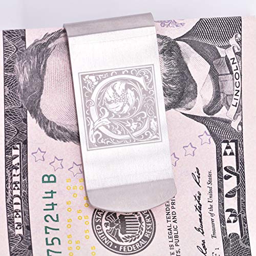 Brushed steel money clip with an ornate initial C on a five dollar bill