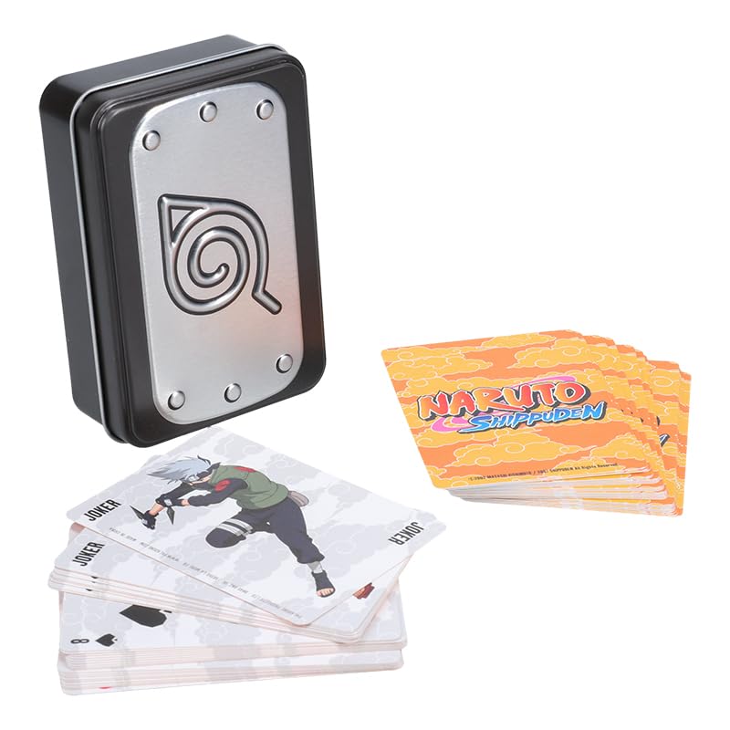 Black tin with a silver leaf village plate beside anime playing cards with orange backs