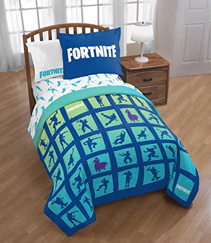 Bed with a blue and teal Fortnite comforter of dance emote squares and a Fortnite sham