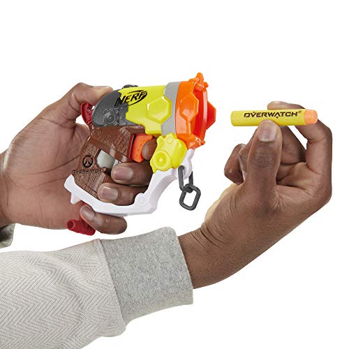 Hand loading a yellow Overwatch dart into the Roadhog blaster