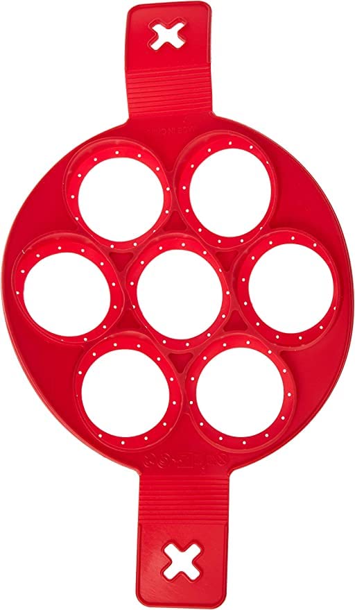 Red silicone pancake mould with seven round rings and two handles