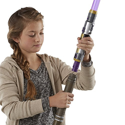 Girl connecting a purple lightsaber to the end of Rey's staff