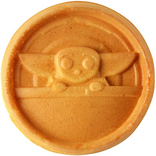 Round golden waffle stamped with Grogu peeking from his pod