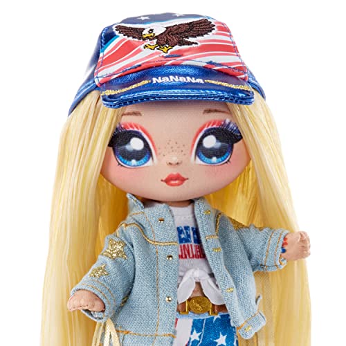 Close-up of the doll's freckled face, eagle print cap and denim jacket
