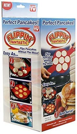Boxed red silicone pancake mould with seven round holes and pour, flip, serve steps
