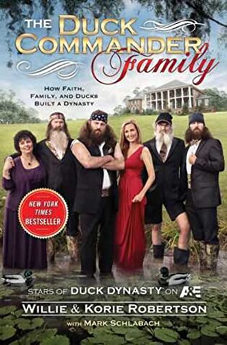 The Duck Commander Family book cover with the Robertson family in a swamp