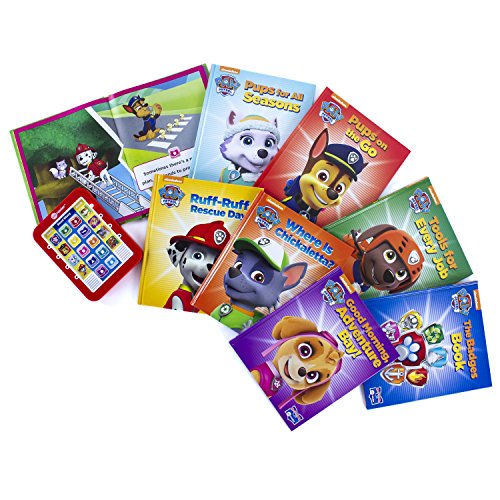 Eight Paw Patrol storybooks fanned out beside the red Me Reader pad