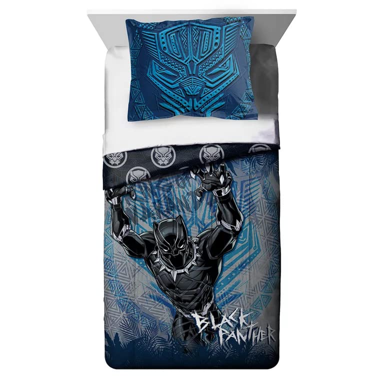 Twin bed with a grey and blue Black Panther comforter and blue tribal-mask pillow sham