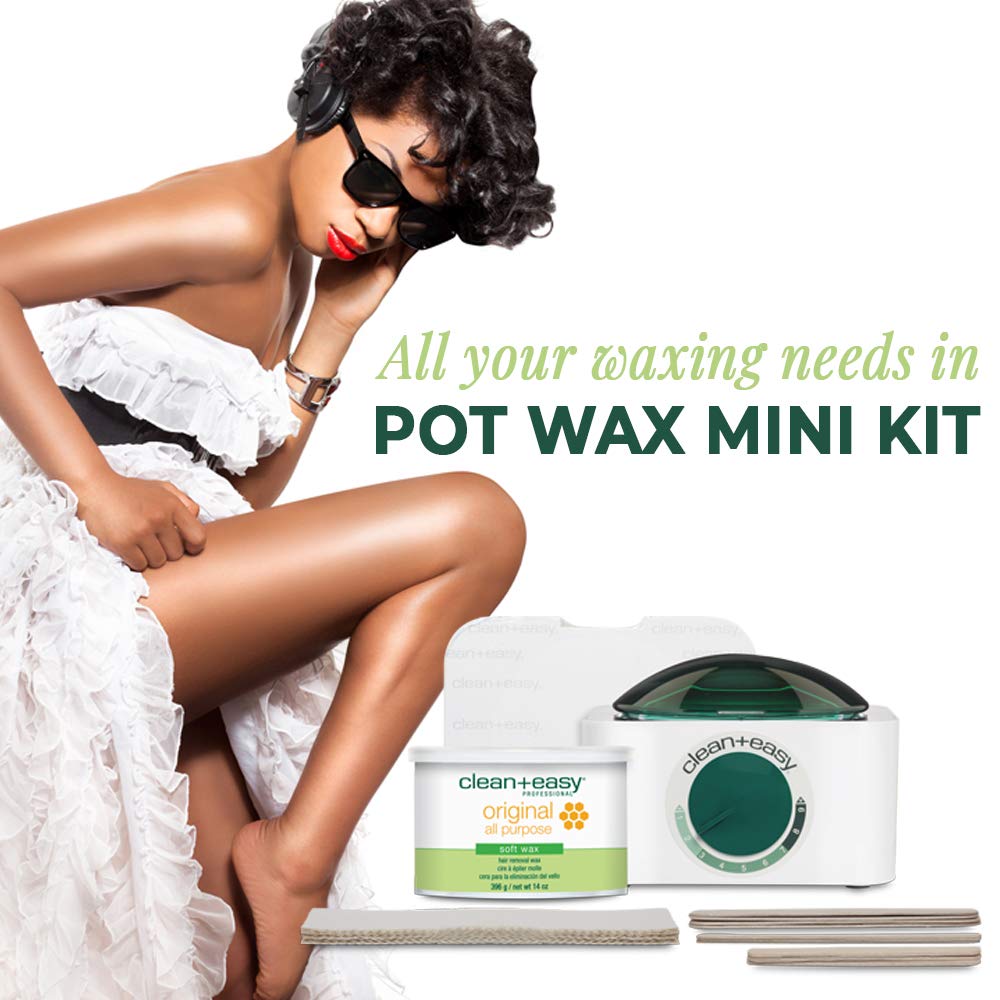Woman in a white ruffled dress beside the wax warmer kit