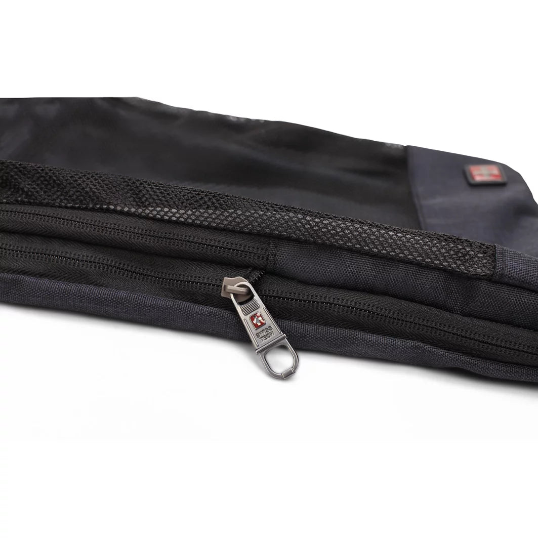Close-up of the mesh edge and expansion zipper on a black packing cube