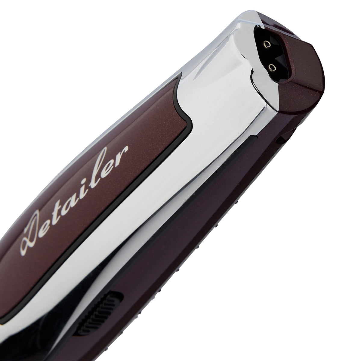 Close-up of the trimmer's charging contacts on the base of the handle