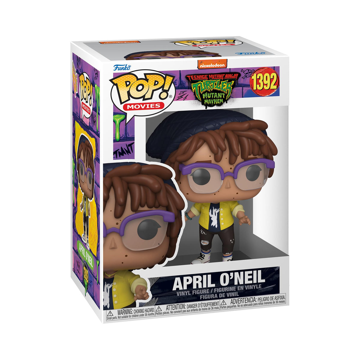 April O'Neil vinyl figure number 1392 with purple glasses and yellow jacket in its box