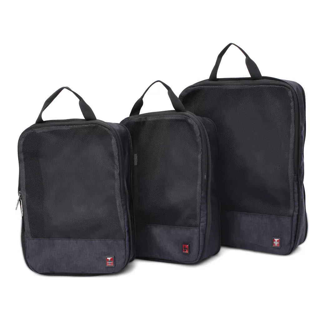 Three black SwissTech packing cubes in small, medium and large with mesh tops and handles