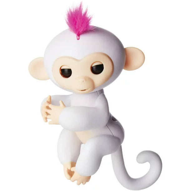 White Fingerlings baby monkey Sophie with a pink tuft of hair