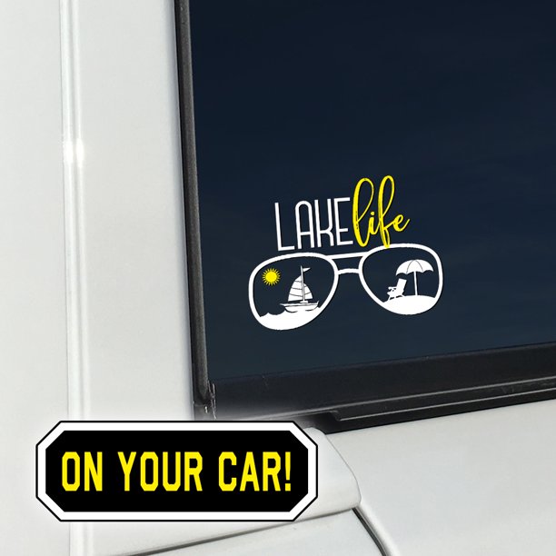 White and yellow Lake Life sunglasses decal on a dark car window