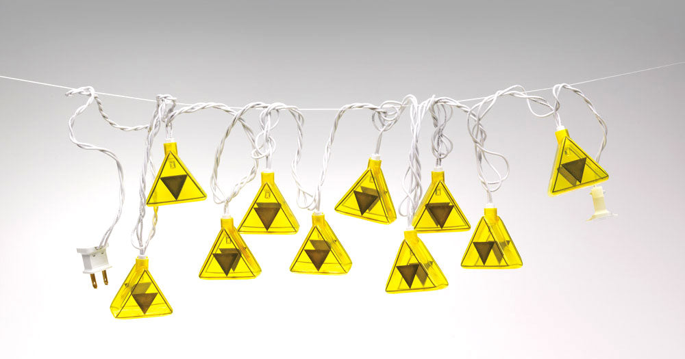 Full string of ten yellow Triforce lights hanging from a line with the plug